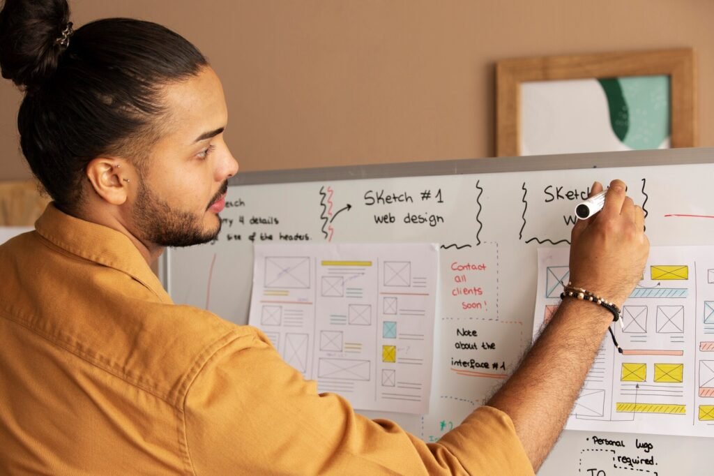 medium shot man sketching web design 23 2149930947